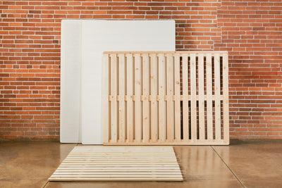 Wooden bed frame slats, bunkie boards, and bed base upholstered in organic cotton fabric