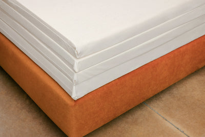 Internal natural Talalay latex layers wrapped in organic cotton muslin of the Oxford 9" natural latex mattress