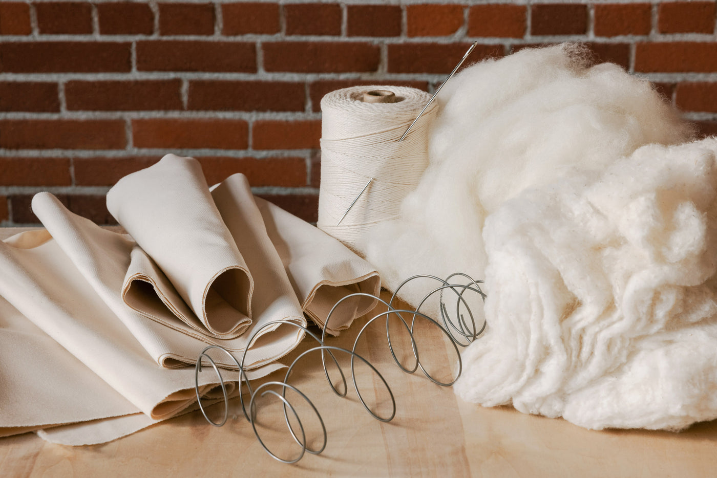 Natural materials of Suffolk spring mattress including wool, cotton, organic cotton fabric, and pocket coil spring