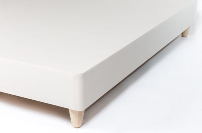 Mattress Base with organic cotton wrapping and natural wood round legs