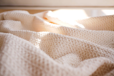 Organic cotton waffle blanket laid out